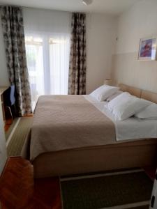 Postel nebo postele na pokoji v ubytování Apartment Bonaca