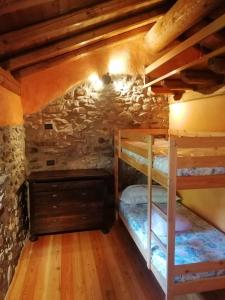 Postel nebo postele na pokoji v ubytování Baita Jarica