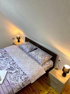 Postel nebo postele na pokoji v ubytování Sobe Baranin Zabljak