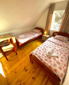 Postel nebo postele na pokoji v ubytování Sobe Baranin Zabljak + 16 fotografií