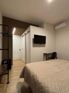 TV a/nebo společenská místnost v ubytování Eva suite