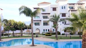 Bazén v ubytování Maha Beach Cabo Negro Duplex 6 person nebo v jeho okolí
