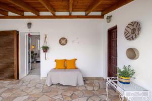 Ένα ή περισσότερα κρεβάτια σε δωμάτιο στο Mira Seaside Residence