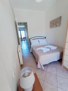 Posteľ alebo postele v izbe v ubytovaní Georgias House + 17 fotografií