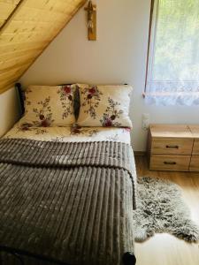 Posteľ alebo postele v izbe v ubytovaní Domek na Wzgórzu + 10 fotografií