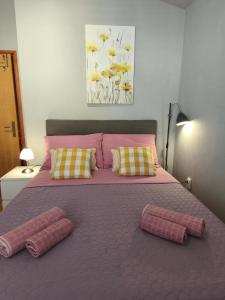 Posteľ alebo postele v izbe v ubytovaní Apartment LaMaro