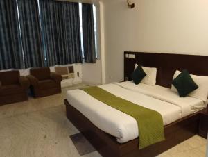Voodi või voodid majutusasutuse Hotel Hight le mount toas