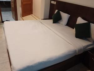 Voodi või voodid majutusasutuse Hotel Hight le mount toas