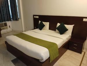 Voodi või voodid majutusasutuse Hotel Hight le mount toas