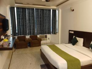 Voodi või voodid majutusasutuse Hotel Hight le mount toas