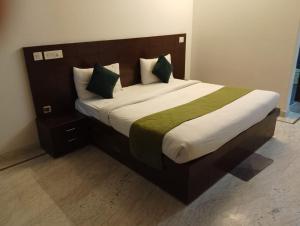 Voodi või voodid majutusasutuse Hotel Hight le mount toas