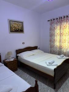 Postel nebo postele na pokoji v ubytování Albi's Guesthouse