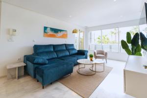 Posezení v ubytování Luxe appartement met jacuzzi, uitzicht & zwembaden