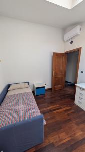 Postel nebo postele na pokoji v ubytování Attico Vittoria