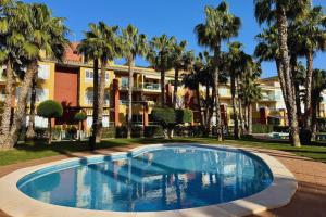 Bazén v ubytování Luxe appartement met jacuzzi, uitzicht & zwembaden nebo v jeho okolí