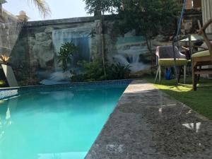 Bazén v ubytování modern villa with coverable pool sheik zayed nebo v jeho okolí