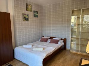 Posteľ alebo postele v izbe v ubytovaní Apartamenty Skaldowie