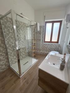 a bathroom with a shower and a sink at La Casa Del Matese in Piedimonte dʼAlife +14 photos