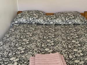 Ένα ή περισσότερα κρεβάτια σε δωμάτιο στο 4 bedroom apartment +1 φωτογραφίες