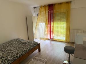 Ένα ή περισσότερα κρεβάτια σε δωμάτιο στο 4 bedroom apartment