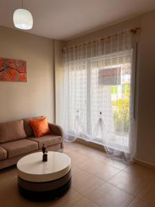 منطقة جلوس في Apartment Gjiri i Lalzit