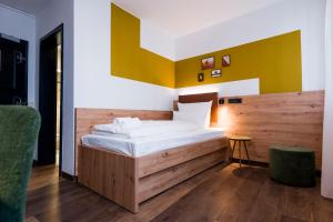 Voodi või voodid majutusasutuse Hotel Sandkorn toas