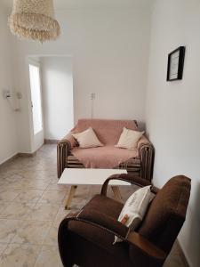 Posezení v ubytování Departamento céntrico