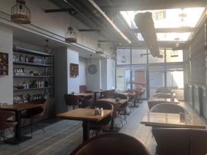 A restaurant or other place to eat at Class Hotel