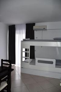 Postel nebo postele na pokoji v ubytování Apartamente Antoni Shengjin