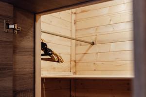 a pair of shoes in a sauna at Къща Инфинити Лукс и Уют, Вплетени в Спомени in Sapareva Banya +64 photos