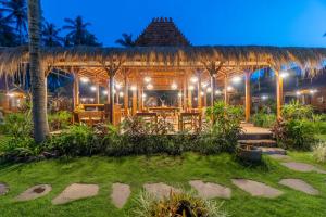 Zahrada ubytování Dani Beach Villa - Beachfront Villas in Penuktukan
