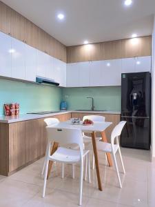 Η κουζίνα ή μικρή κουζίνα στο Joie Apartment Hue