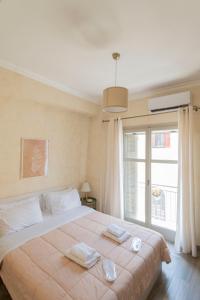 Postel nebo postele na pokoji v ubytování Maisonette Pylos
