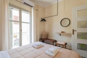 Postel nebo postele na pokoji v ubytování Maisonette Pylos