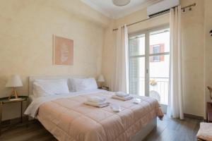 Postel nebo postele na pokoji v ubytování Maisonette Pylos