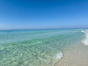 a view of the ocean from the beach at Surf N Snooze-Central Destin-Pet Friendly in Destin
