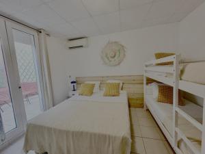 Postel nebo postele na pokoji v ubytování Hotel Camille