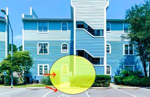 ein Kreis mit einem Haus vor einem Gebäude in der Unterkunft Corporate Suite Midtown Wilmington in Wilmington