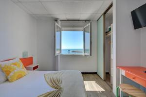 Postel nebo postele na pokoji v ubytování Hotel Camille
