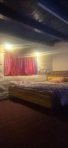 Ένα ή περισσότερα κρεβάτια σε δωμάτιο στο Nest&Rest