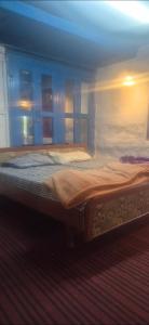 Ένα ή περισσότερα κρεβάτια σε δωμάτιο στο Nest&Rest