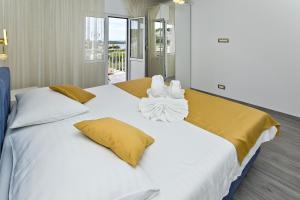 Posteľ alebo postele v izbe v ubytovaní Villa Zorana hostel