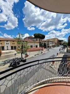 a view of a city street from a balcony at Casa Vacanze Fiore Ciampino Airport - Rome Station - 108 mqs in Ciampino