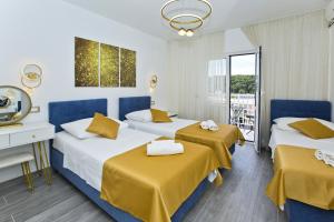 Posteľ alebo postele v izbe v ubytovaní Villa Zorana hostel