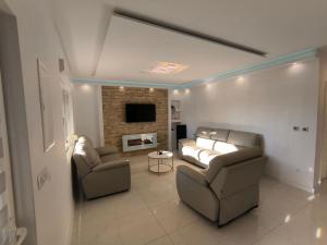 TV a/nebo společenská místnost v ubytování Apartments Villa Tanja