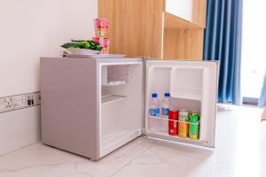 Kuchyň nebo kuchyňský kout v ubytování Đức Dũng Hotel