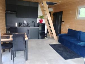 Køkken eller tekøkken på Domek nad Jeziorkiem Sauna -Silownia-Balia