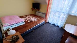 Postel nebo postele na pokoji v ubytování Delfin -przy plaży, widok na morze