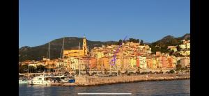 a view of a city from the water at Menton - SABLETTES BEACH VIEW in Menton