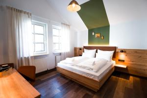 Voodi või voodid majutusasutuse Hotel Sandkorn toas